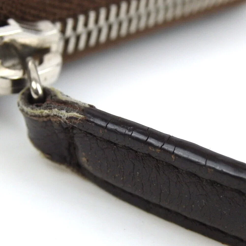 Authentic Christian Dior Cannage-embossed zip-around purse leather [Used]